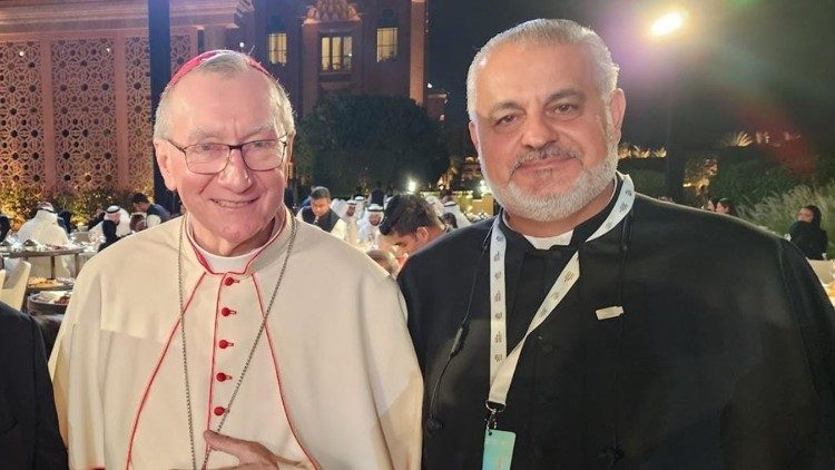 Padre Bader con il cardinale Parolin